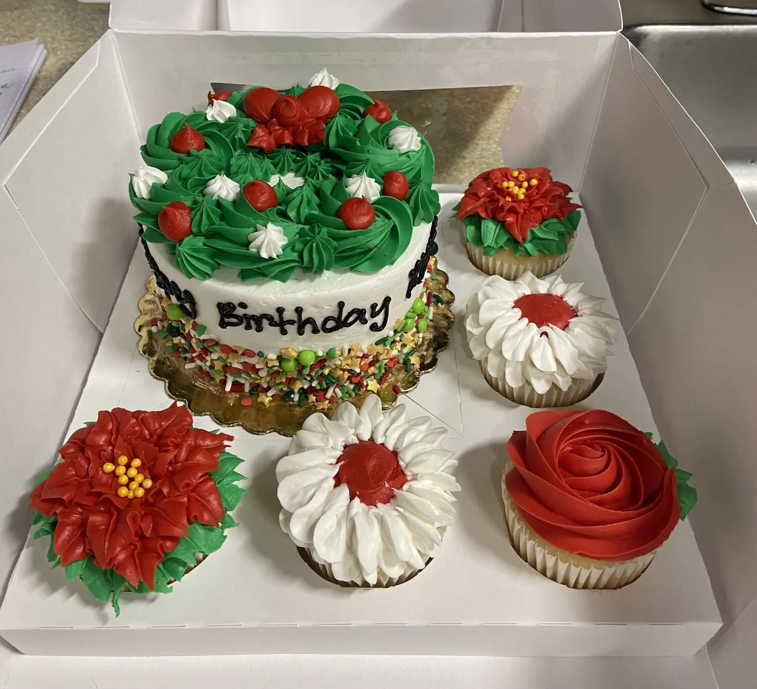 Floral cake and cupcakes