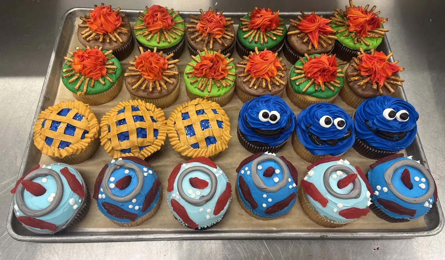 Colorful character cupcakes